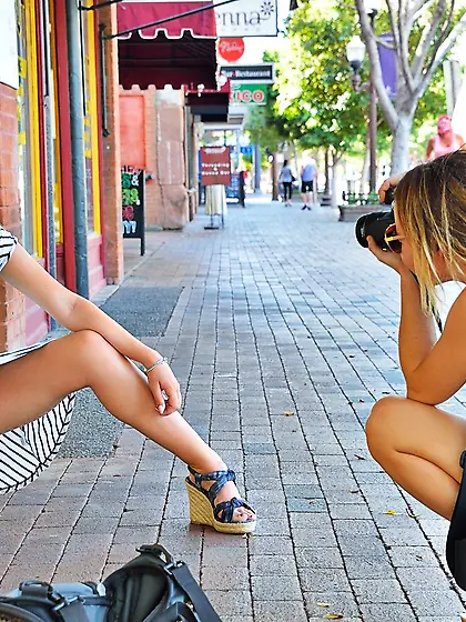 Naughty blonde with big naturals shamelessly posing in public