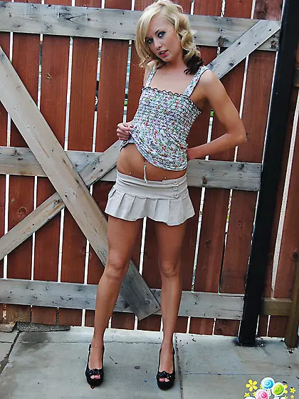 Naughty teen blonde teases with her tiny tits and shaved pussy o