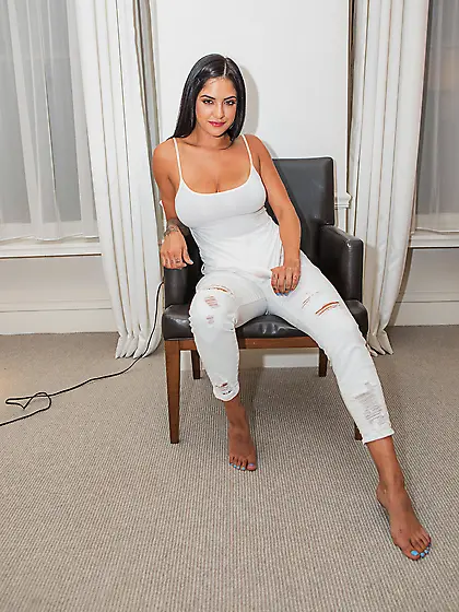 Babe takes white jeans and top off flaunts her curvy inked body