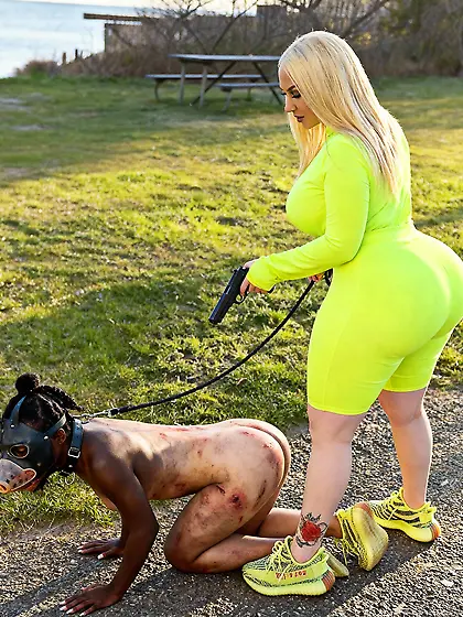 Pawg has nigger on leash and at gunpoint