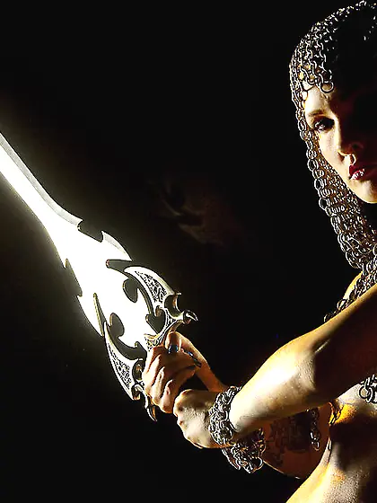 Melodie Gore strips her medieval chainmail outfit off and shows