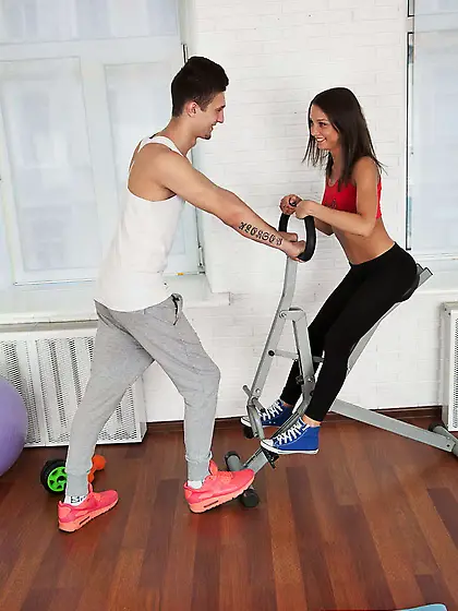 Slim sexy babe fucked and facialized on fitness mat in front of