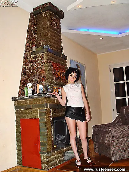 Russian teen brunette fucks her shaved pussy with dildo