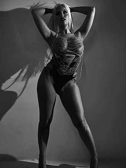 Curvy blonde revealing black