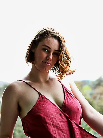 Pretty redhead begins new day by stuffing hairy muff with toy on