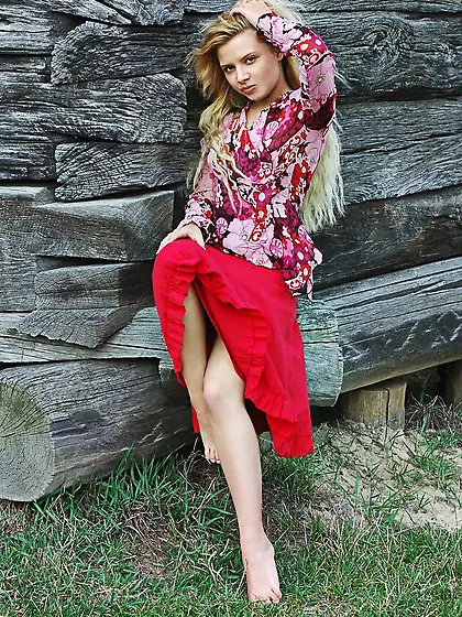 Blonde with a body to die for shows off her titties in a village