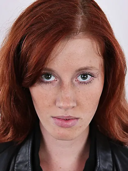 Innocent redhead slim figure