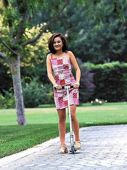 Cheryl Dynasty is on a scooter.  she humps it then fucks herself