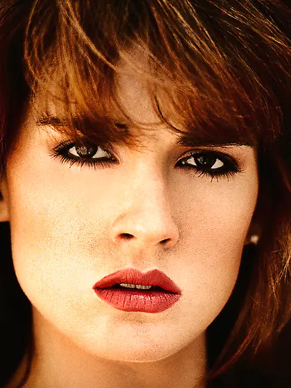 Classy brunette model showing her nice rack