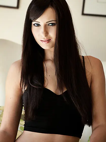 Black top blue-eyed brunette