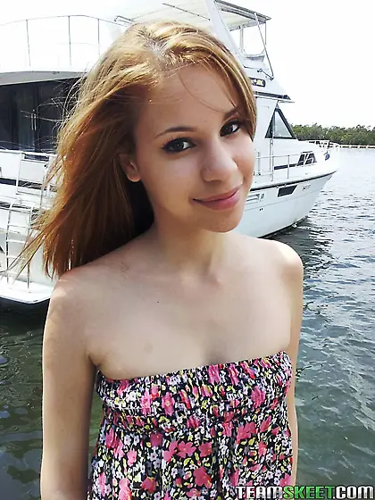 Tiny teen Latina Mae Olsen worlks her oral sex skills on a monst