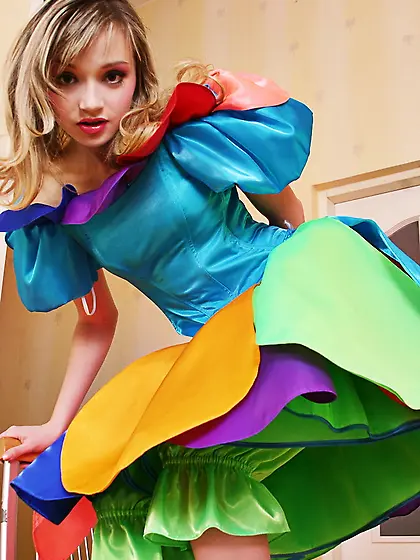 Beautiful blonde model Kristina Fey takes off her colorful dress