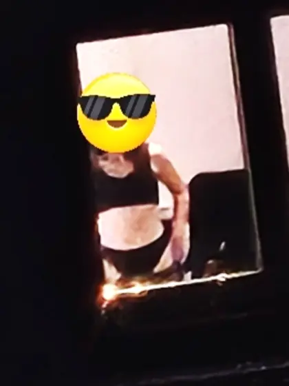 Old window peep pics---gal in her thongs