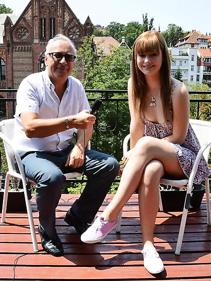 Nasty chick gives an interview and follows cameraman inside to b