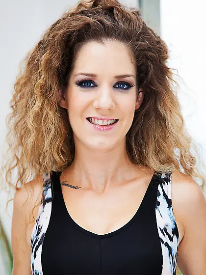 Curly brunette girl sucks