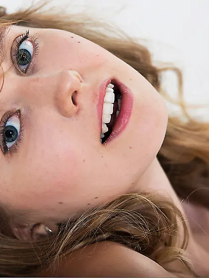 Young slender babe with golden hair Olyana T enjoys in taking of