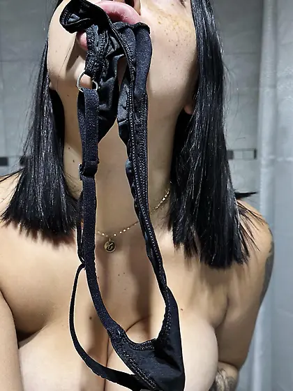 Panties in her mouth
