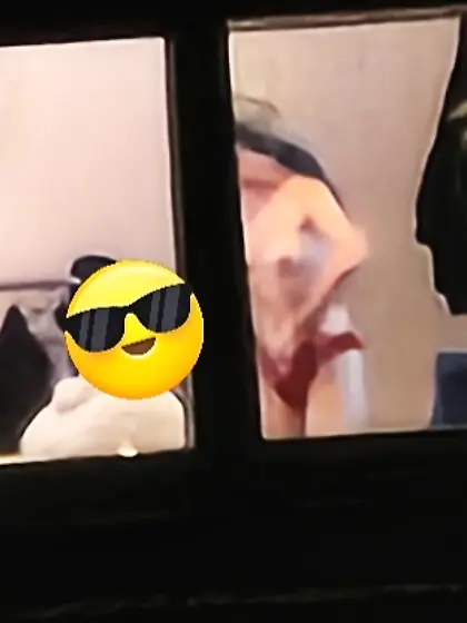 Old window peep pics---gal in her thongs