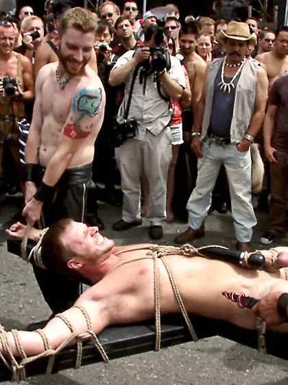 Crowd watches tied stud