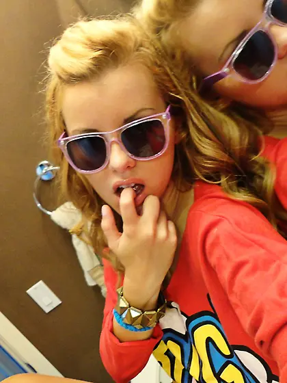 Posh blonde poses half-naked on camera before satisfying a well-