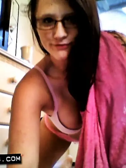 Lying closely to the cam kinky brunette Freckles slides hand ins