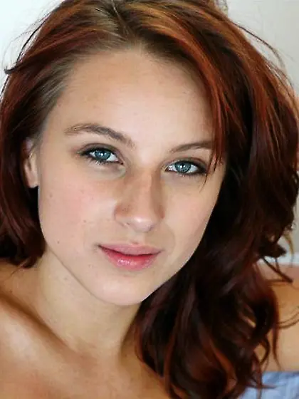 Tattooed redhead momma Dani Woodward with small boobies sucking