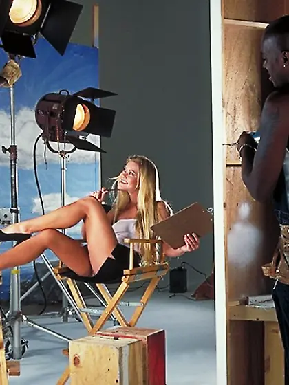 Horny blonde slut Julie Meadows gets down on her knees and sucks