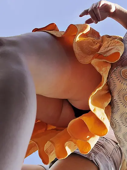 Upskirt English Blonde in Orange Sun Dress