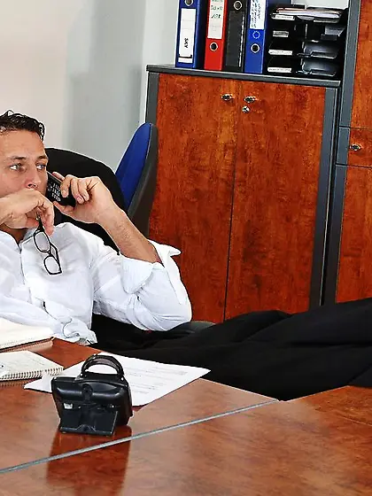 Nasty blonde secretary Kathia Nobili fingering her shaved cunny