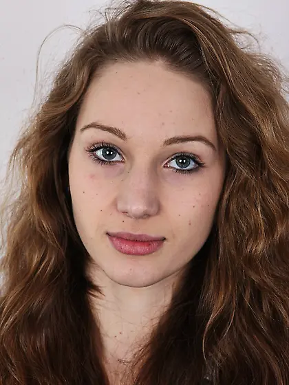 Young tattooed cute seductress