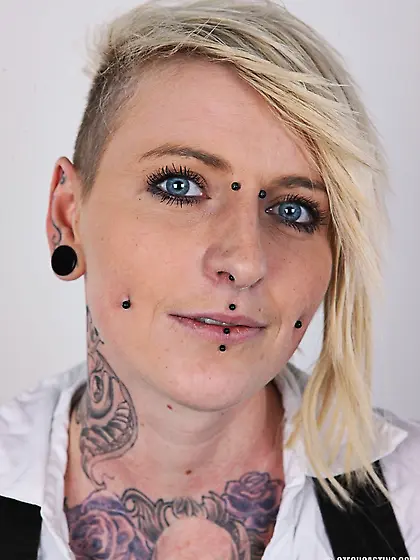 Wild blonde multiple tattoos