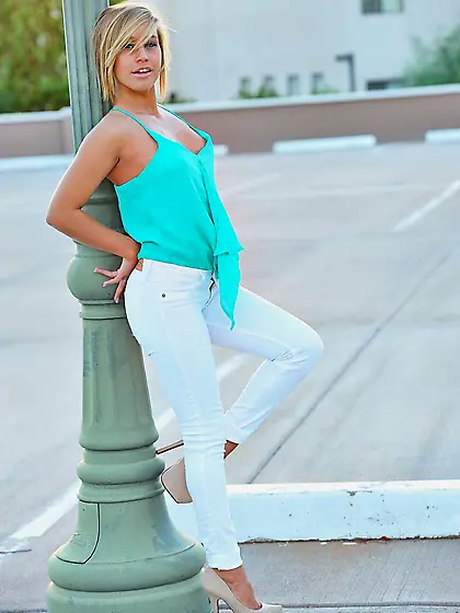 Salacious blonde teen Kennedy Leigh is rubbing pussy with hand a