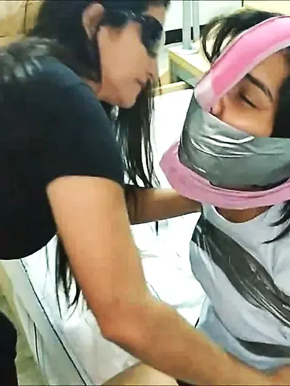 Panty Hooded Girl Gagged With Socks And Tape