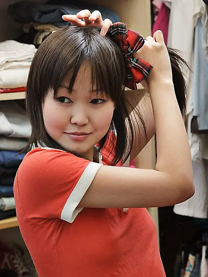 Asian schoolgirl shows upskirt and prepares for hard loving