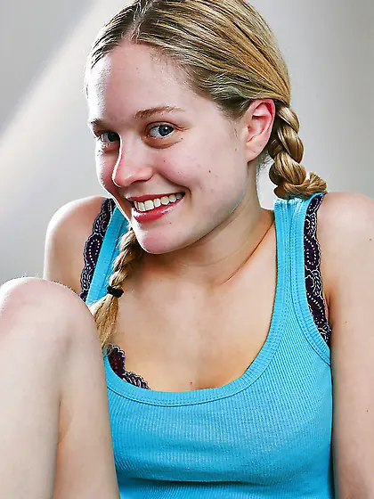 Pigtailed blondie shows her flexibility and gets off as well