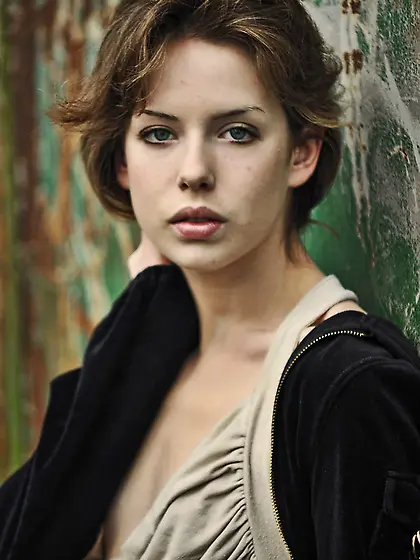 This skinny brunette gets naked outdoors.