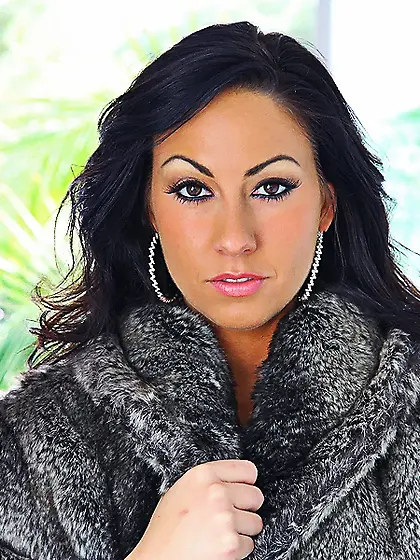 Alluring brunette model Tiffany Brookes strips her black lingeri