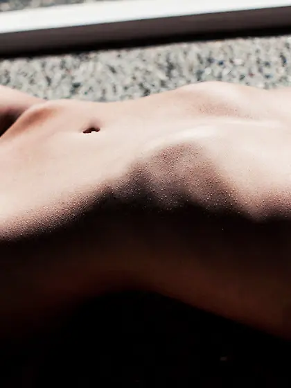 Beautiful brunette chick Ashley Rose smiles at the camera while