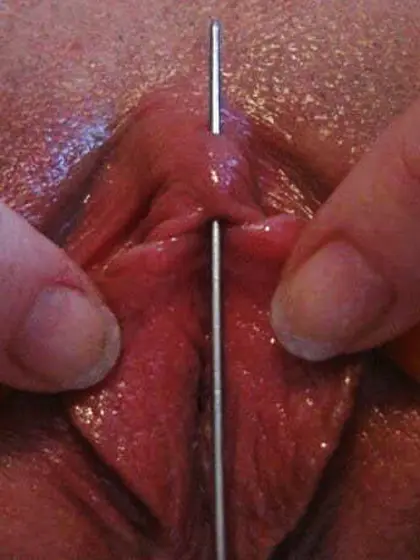 Needle through Clit