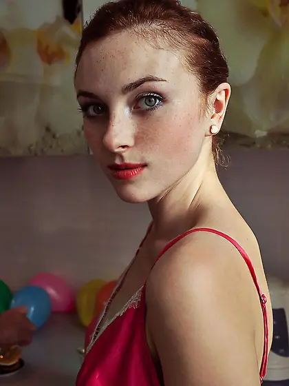 Redhead with beautiful eyes doesn't want to hide her sweet