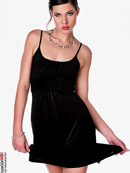 Lusty brunette model Olivia La Roche is wearing a cool black dre