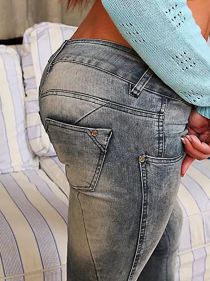 Dark-haired and brown-eyed beauty shows off her awesome body