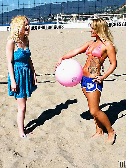 Tattooed blondie curly hair