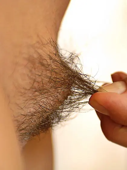 Good looking girl rams a glass toy in her pussy and it's am