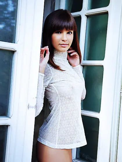 This brunette Zelda B was hiding the nice shaved pussy between l