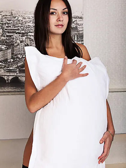 Pretty chick takes pillow