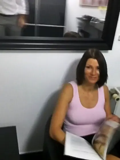 Big-titted brunette pink vest