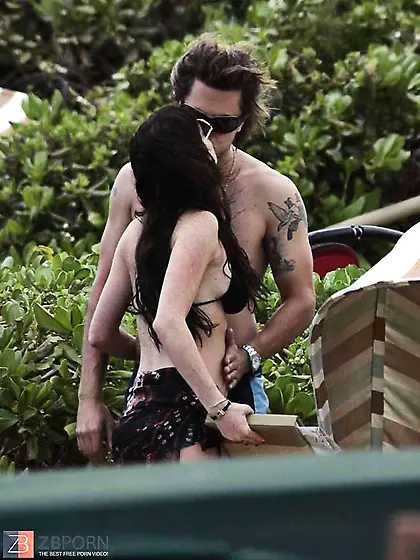 Lindsay Lohan having her tits grabbbed at the beach