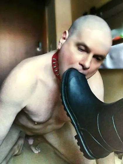 bald slave worships the boot mistress