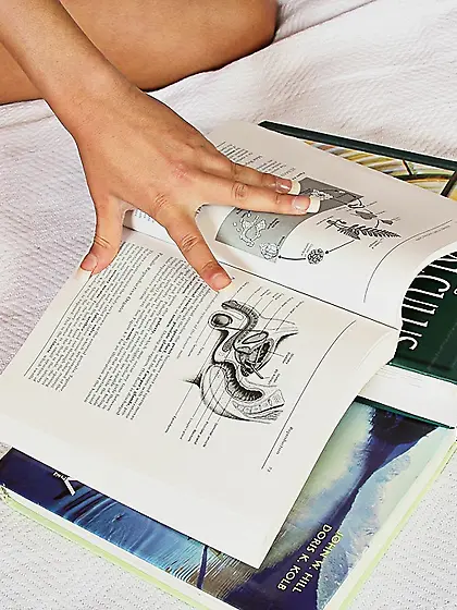 Petite dark haired babe Cassidy Morgan with pierced clit spreads